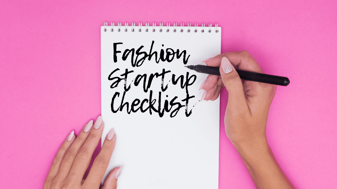 Image of a notebook on which is written fashion startup checklist